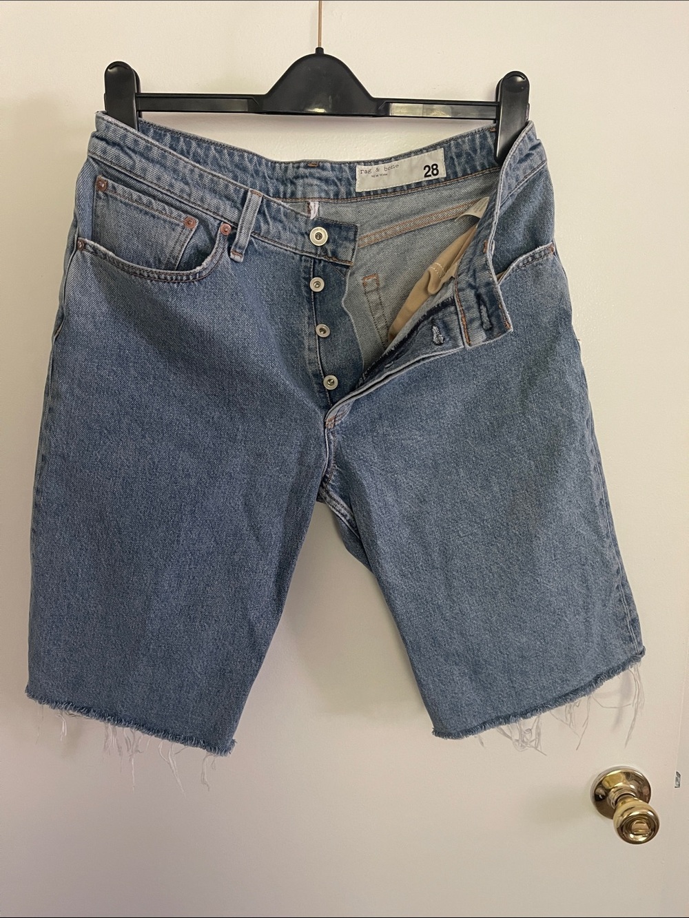 rag & bone denim shorts with a raw, frayed hem and a classic button fly.
